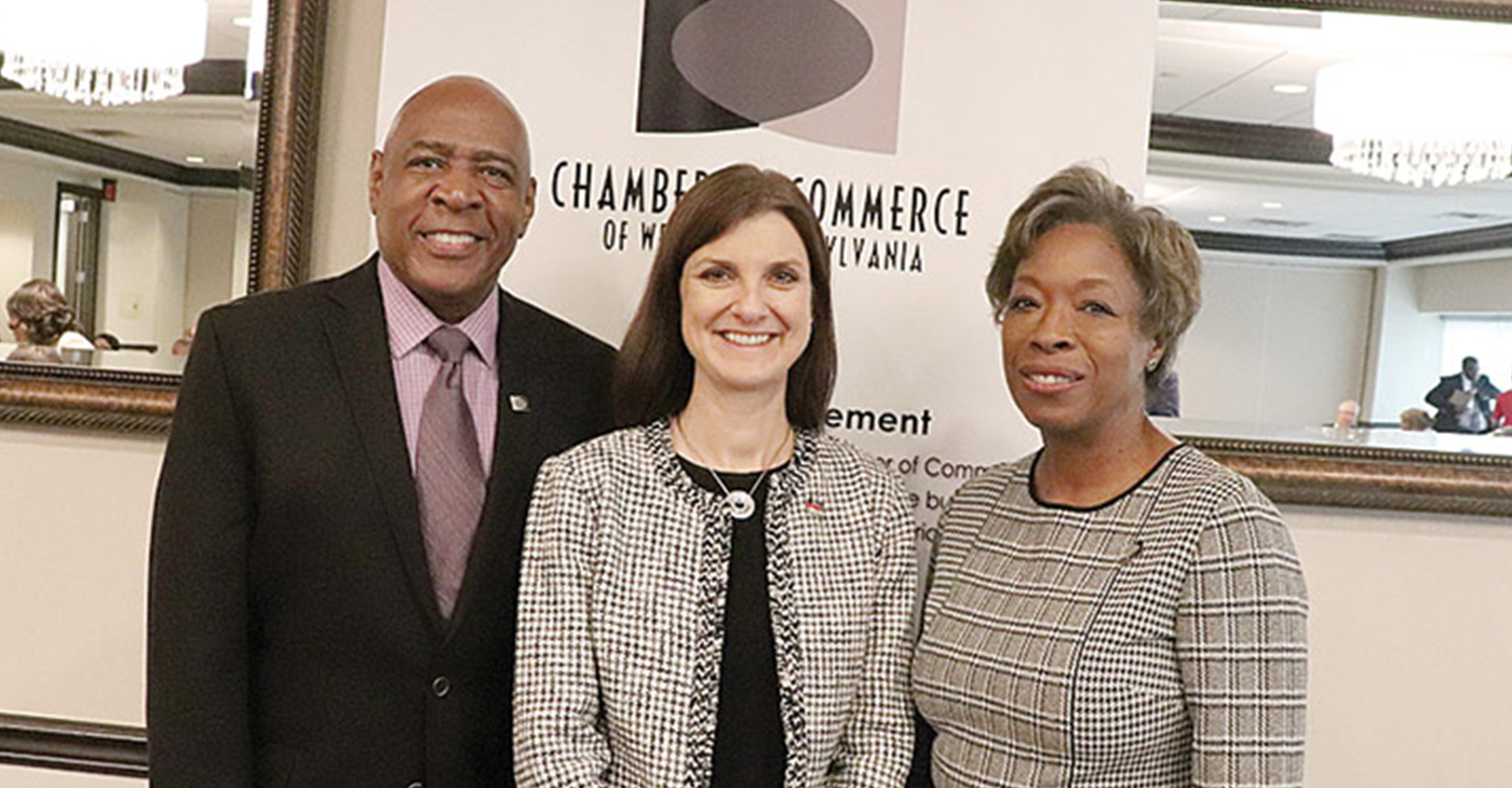 NEW PARTNERS—Chamber Board Vice Chair Lou Alexander and President and CEO Doris Carson Williams pose with Diana Charletta of Equitrans (Center), a new President’s Roundtable member.
