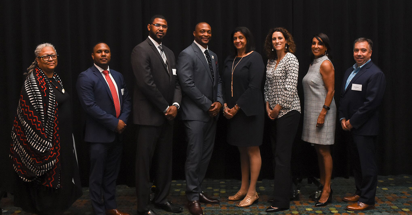 At the fourth annual Francis S. Guess Bridge to Equality Fund luncheon Thursday at the Music City Center. Honoree Gail Williams (fifth from l) poses with panelists (from l) Rev. Dr. Emilie M Townes, Robert Sherrill, Shan Foster, Eddie George, Stephanie White, emcee Vicki Yates, and Sean Henry. (photo by Morgan Yingling/CFMT)